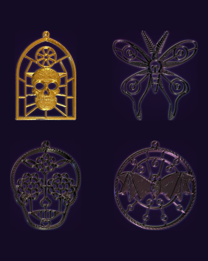 The four small frames, empty as they ship: Gothic Skull Window in silk gold, and Death's-head Moth, Sugar Skull and Bat over the Harvest Moon in silk black-purple
